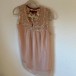 Great condition.  Bohemian, sleeveless top.